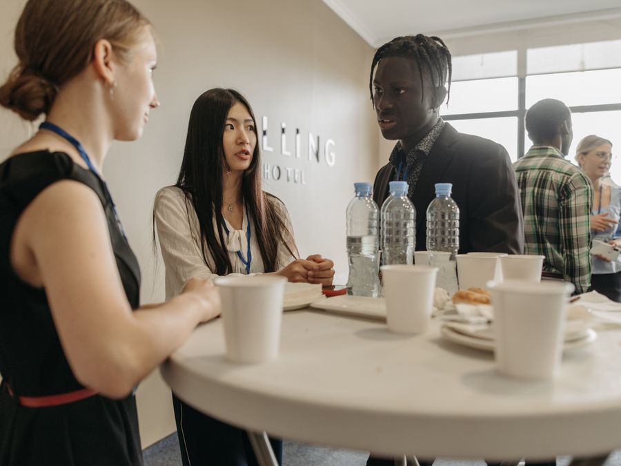 Participants talking together at a workshop