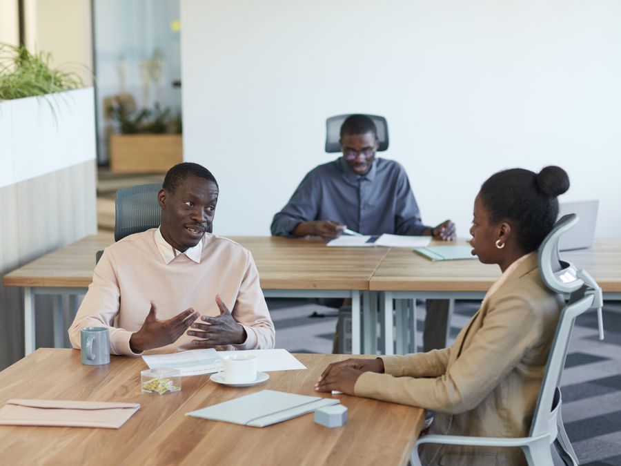 A group sitting in a circle in discussion