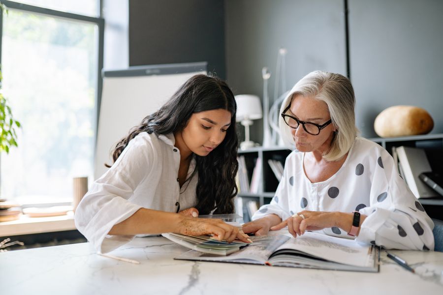 A mentor and a participant mapping out a career plan